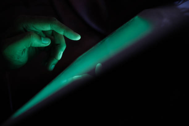 istock close up of hacker hand stealing data, cyber crime 1210543004