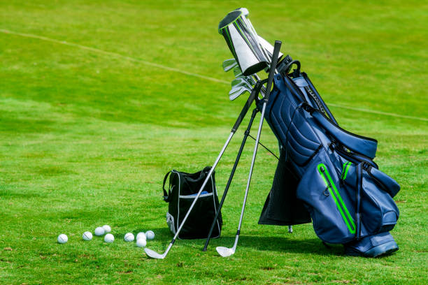 istock Bag of golf clubs on the golf course 1210543036