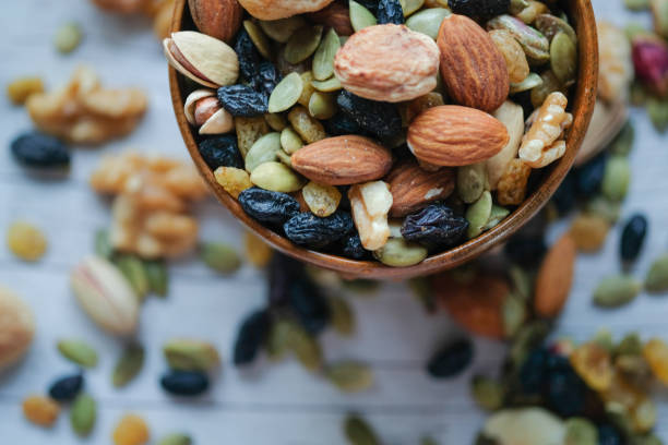 istock top view of mixed nut in a bowl on table 1210543597