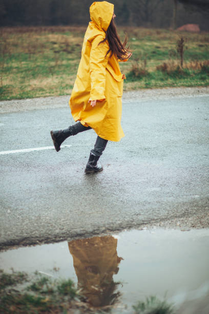 istock Cute girl ready for the rain! 1210545393