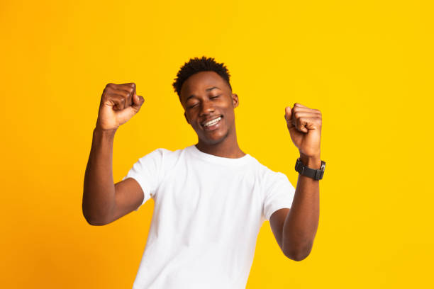 istock Happy african american man smiling, feeling carefree 1210545580