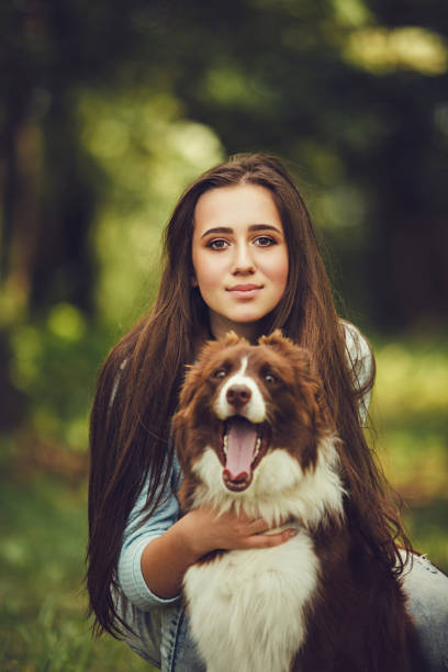 istock woman with collie dog 1210546957