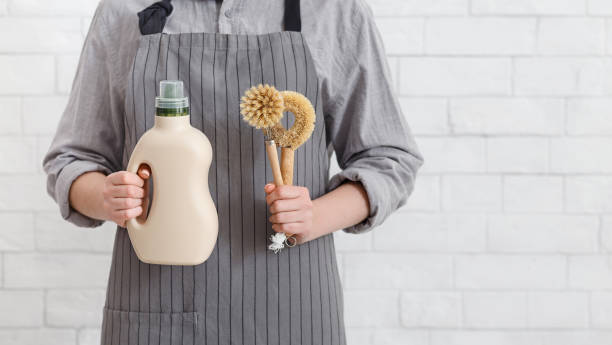 istock Housewife choosing bio natural tools and laundry detergent 1210548162