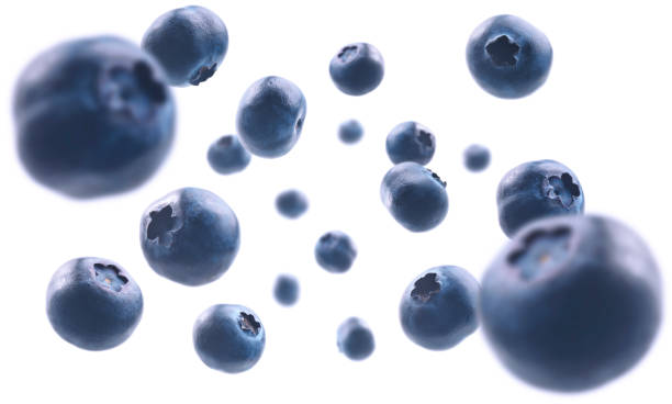istock Ripe blueberries levitate on a white background 1210548389