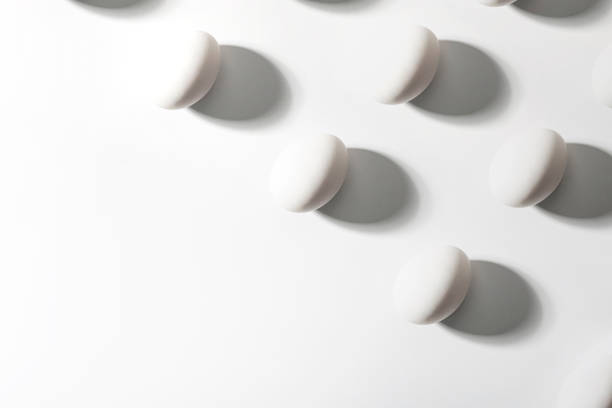 istock Flat lay of eggs on white background 1210551716