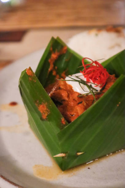 istock Khmer Amok Curry served wrapped in leaves 1210552510
