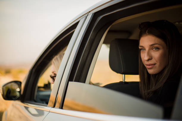istock Two women are enjoying a car ride 1210552590