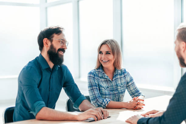 istock managers and job seeker sitting at the table during the interview 1210552792