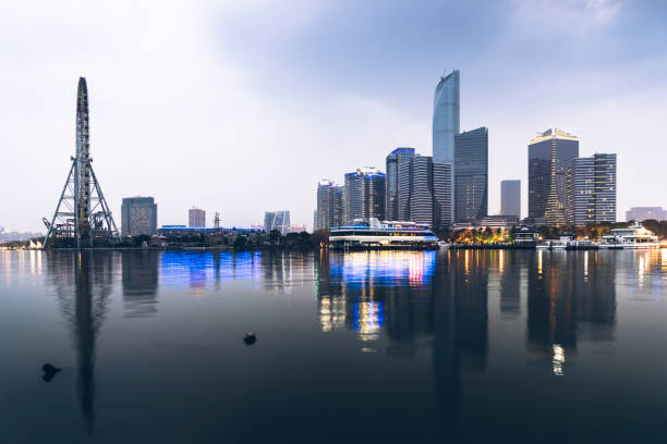 istock empty brick platform with Hong Kong skyline in background at night. 1210554424