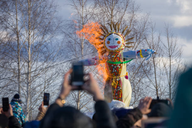 Burning of an effigy at the  festival "Maslenitsa". stock photo