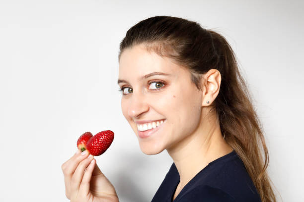 istock Healthy eating red strawberries slim figure 1210562780