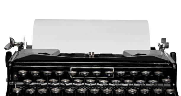 istock Old vintage typewriter and a blank sheet of paper inserted. Isolated 1210562888