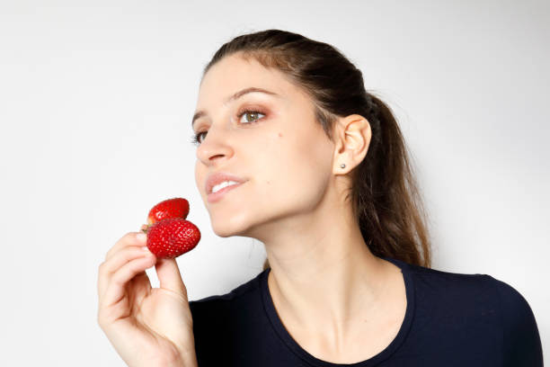 istock Healthy eating red strawberries slim figure 1210563275