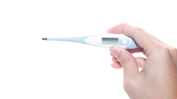 istock Hand is holding thermometer isolated on white background 1210564254