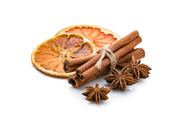 istock Aromatherapy: dried orange slices, cinnamon and star anise isolated on white background 1210564519