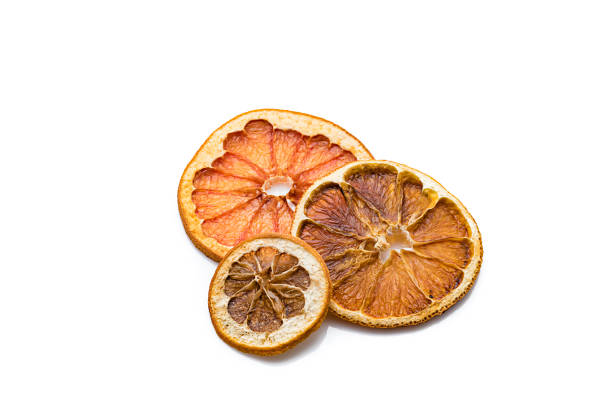 istock Aromatherapy: dried orange slices isolated on white background 1210564537
