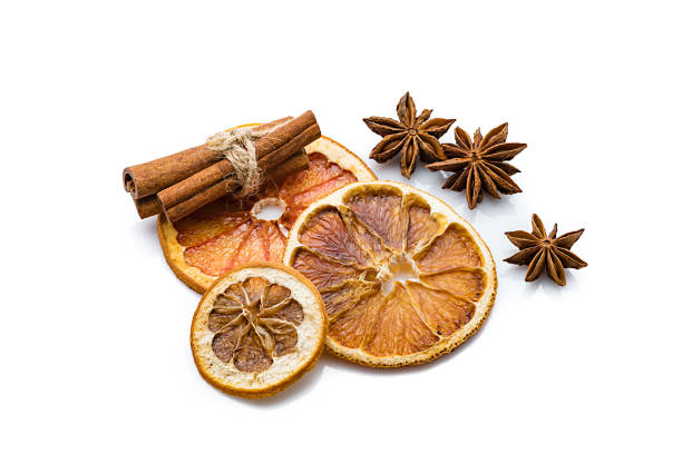 istock Aromatherapy: dried orange slices, cinnamon and star anise isolated on white background 1210564547