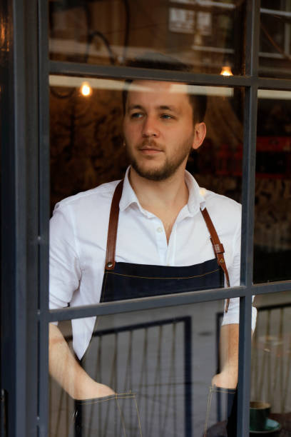 istock Portrait of young cafe owner 1210565429