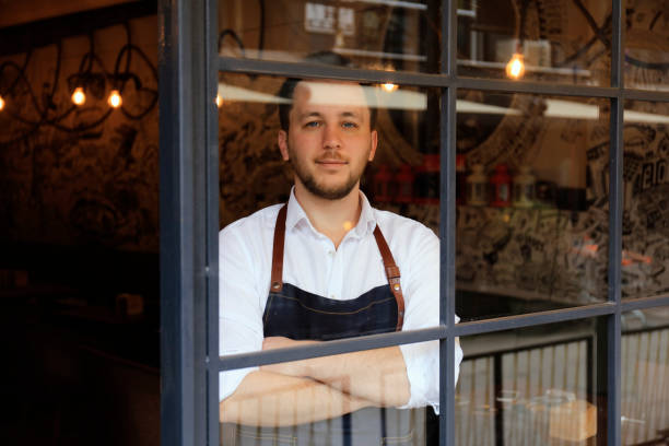 istock Portrait of young cafe owner 1210565586