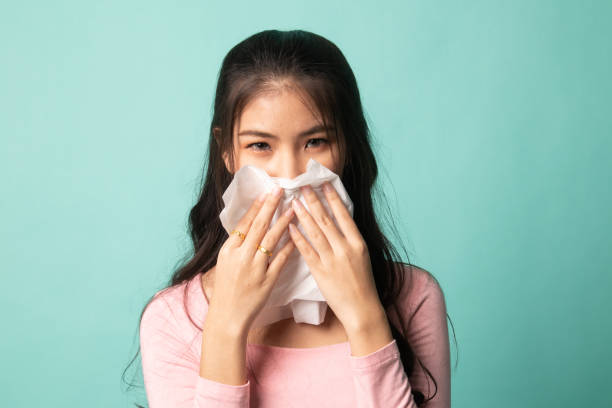 istock Young Asian woman got sick and flu. 1210565710