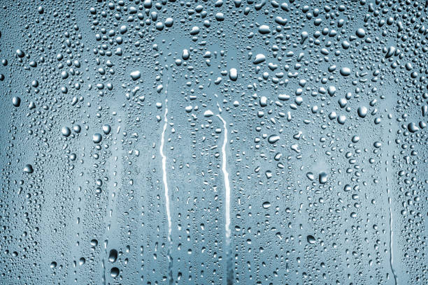 istock texture of large and small drops of water on a matte surface 1210565802