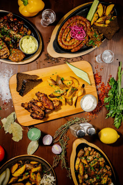istock Many different delicious dishes on the table. Various snacks and antipasti on the table. Restaurant menu.Top view 1210566360