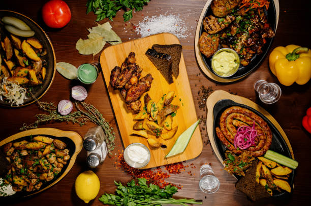 istock Many different delicious dishes on the table. Various snacks and antipasti on the table. Restaurant menu.Top view 1210567139