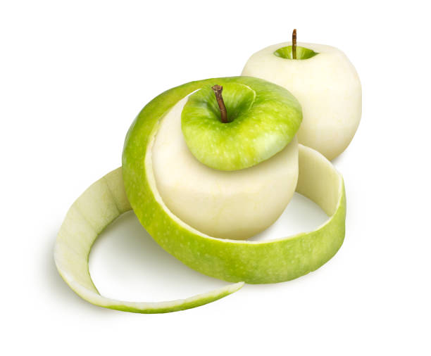 istock Peeled apple with peel on a white background 1210567797