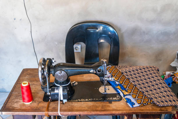 istock Sewing machine and African fabrics in seamstress workshop, Mozambique 1210567850