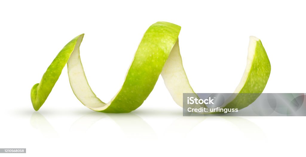 Peeling green apple on a white background Apple - Fruit Stock Photo