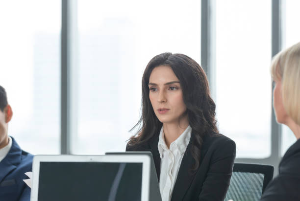 istock Businesswoman in meeting 1210569821