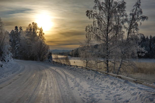 istock A cold dawn on the banks of an unfrozen river 1210570447
