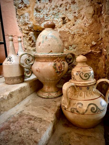 istock Ancient Olive Curing Vessels and Olive Oil Urn 1210574208