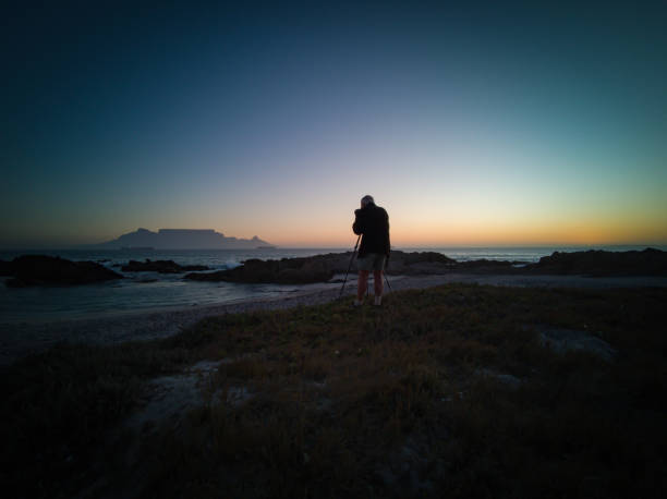 istock Photographer Table Mountain sunset from the beach 1210578266