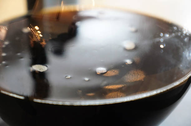 Image of coffee dripping in glass jar