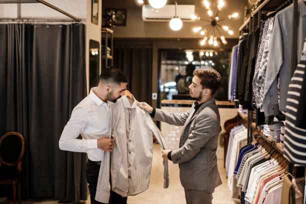 istock Man Choosing A New Shirt 1210582403