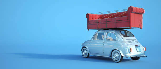 istock Small car with big sofa on the roof 1210582656
