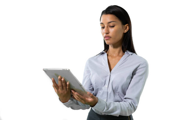 istock Mixed race businesswoman holding a tablet computer on white background 1210582713