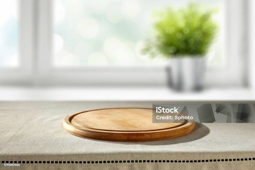 Kitchen Table Background With Space For Advertising Product And Blurred  Background Of Spring Window Sunny Day In The Kitchen Stock Photo - Download  Image Now - iStock