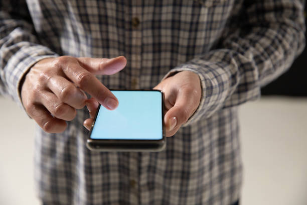istock Caucasian woman using a smartphone 1210586168