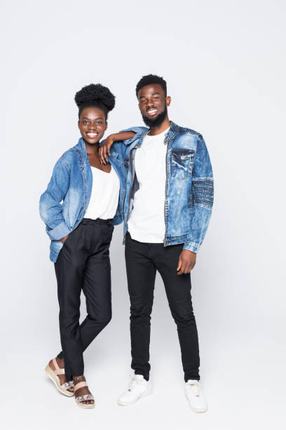 istock African young couple standing on white background 1210586684