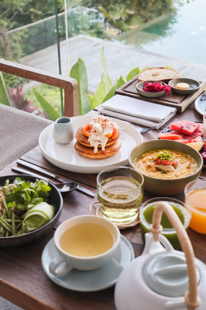 istock Breakfast Table with variety of dishes 1210588053