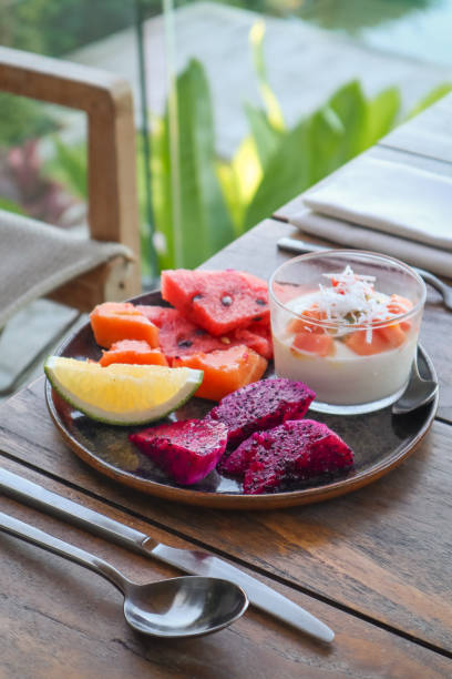 istock Tropical Fruit Platter for Breakfast with vegan coconut yoghurt 1210588059