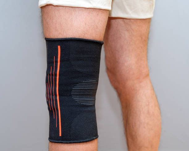 istock elastic bandage on an injured knee 1210589111