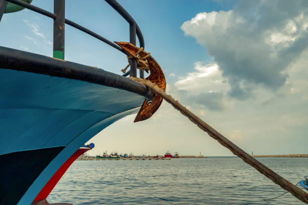 istock fishing boat in the harbor 1210589745