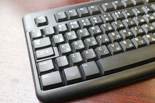 istock black keyboard on the office desk. 1210589920