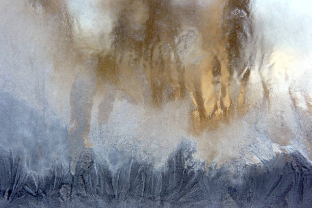 covered with frozen ice window glass. natural textures and backgrounds