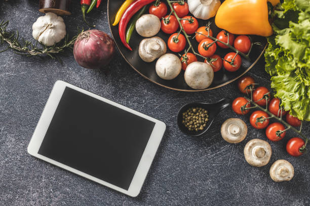 istock Searching vegetables recipe on digital tablet 1210592122