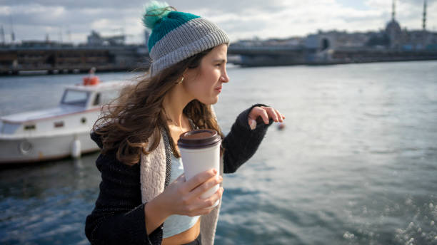 istock Women drink take way coffee 1210592603