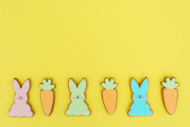 istock Easter card with gingerbread cookies. Egg shaped cookies and easter bunny. 1210592911